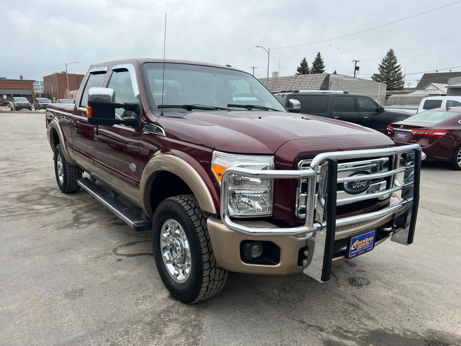 2012 Maroon /Brown Ford F-350 SD King Ranch (1FT8W3BT7CE) with an 6.7L V8 F OHV 32V DIESEL engine, Automatic transmission, located at 116 5th Avenue South, Lewistown, MT, 59457, 47.063877, -109.427879 - Introducing the ultimate combination of power and luxury – the 2012 Ford F350 Crew Cab King Ranch 4x4. With its robust Powerstroke diesel engine, this truck is built to handle anything you throw at it. Whether you're towing a trailer or cruising around town, the F350 delivers top-notch performance - Photo #0
